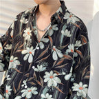 AM Vision RO retro tie-dye shirts featuring a floral pattern and button-up design