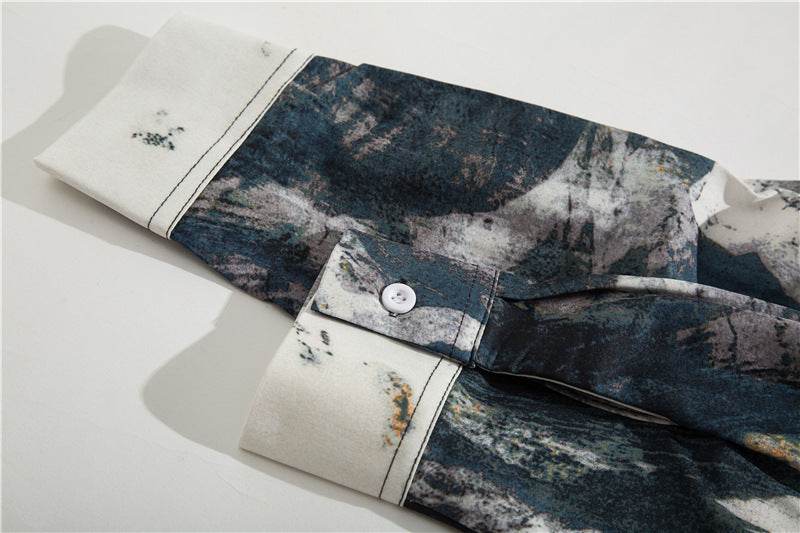 Close-up of AM Vision RO retro tie-dye shirts showcasing unique patterns and buttoned cuffs