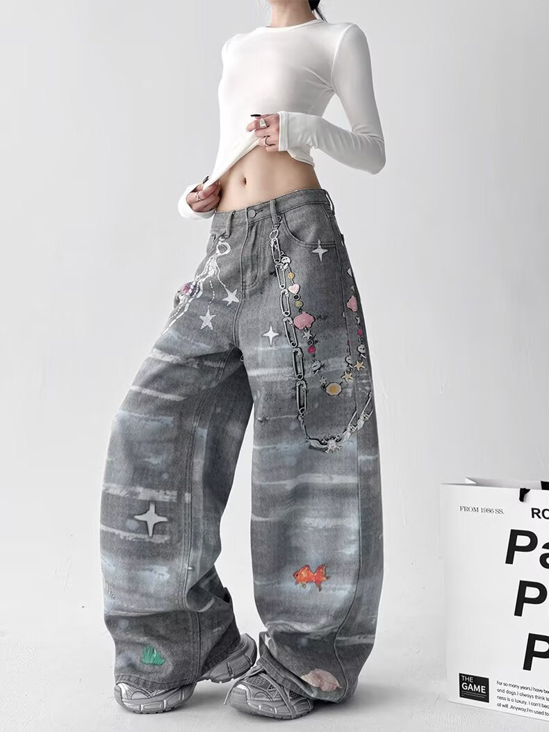 Model wearing Retro Washed Distressed 3D Print Chain Jeans with unique graphic designs and a relaxed fit