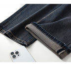 Close-up of RetroBloom Embroidered Jeans showcasing cuff detail and soft denim fabric