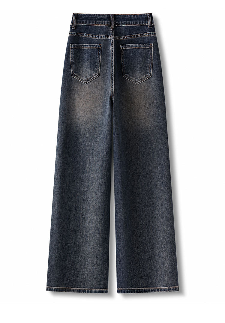Back view of RetroBloom Embroidered Jeans in dark wash with wide-leg design and large pockets