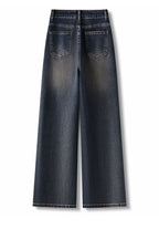 Back view of RetroBloom Embroidered Jeans in dark wash with wide-leg design and large pockets