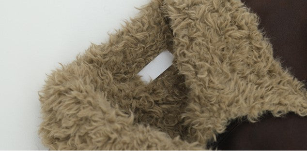 Close-up of the collar on a Reversible Winter Suede Jacket featuring soft, fuzzy texture