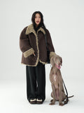 Reversible Winter Suede Jacket in Brown with Fur Trim, styled with a model and a dog