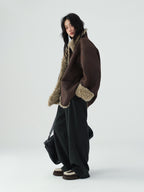 Model wearing a stylish Reversible Winter Suede Jacket in brown and beige for a trendy winter look