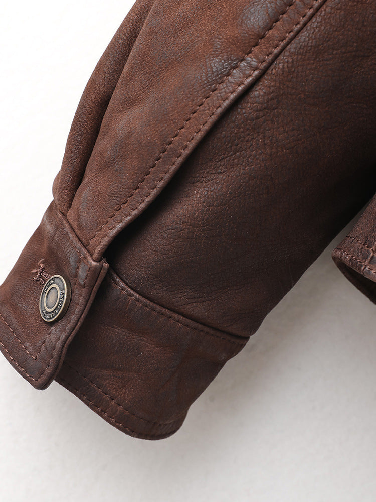 Close-up of Rheon Wool Collar Goatskin Moto Jacket showing detailed stitching and button design