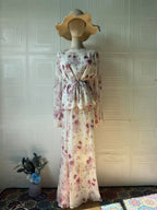 Rose Meadow Two-Piece Maxi Set featuring floral design and a stylish tied waist top