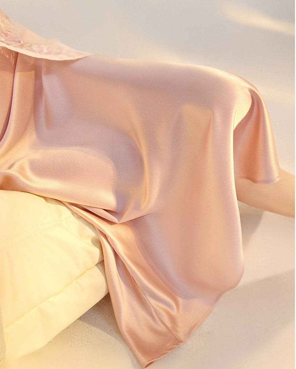 Soft Pink Satin Slip Dress with a Flowing Design for Elegant Evening Wear