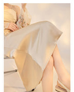 Elegant Satin Slip Dress in Light Beige with Flowing Hem and Comfortable Fit for Stylish Occasions