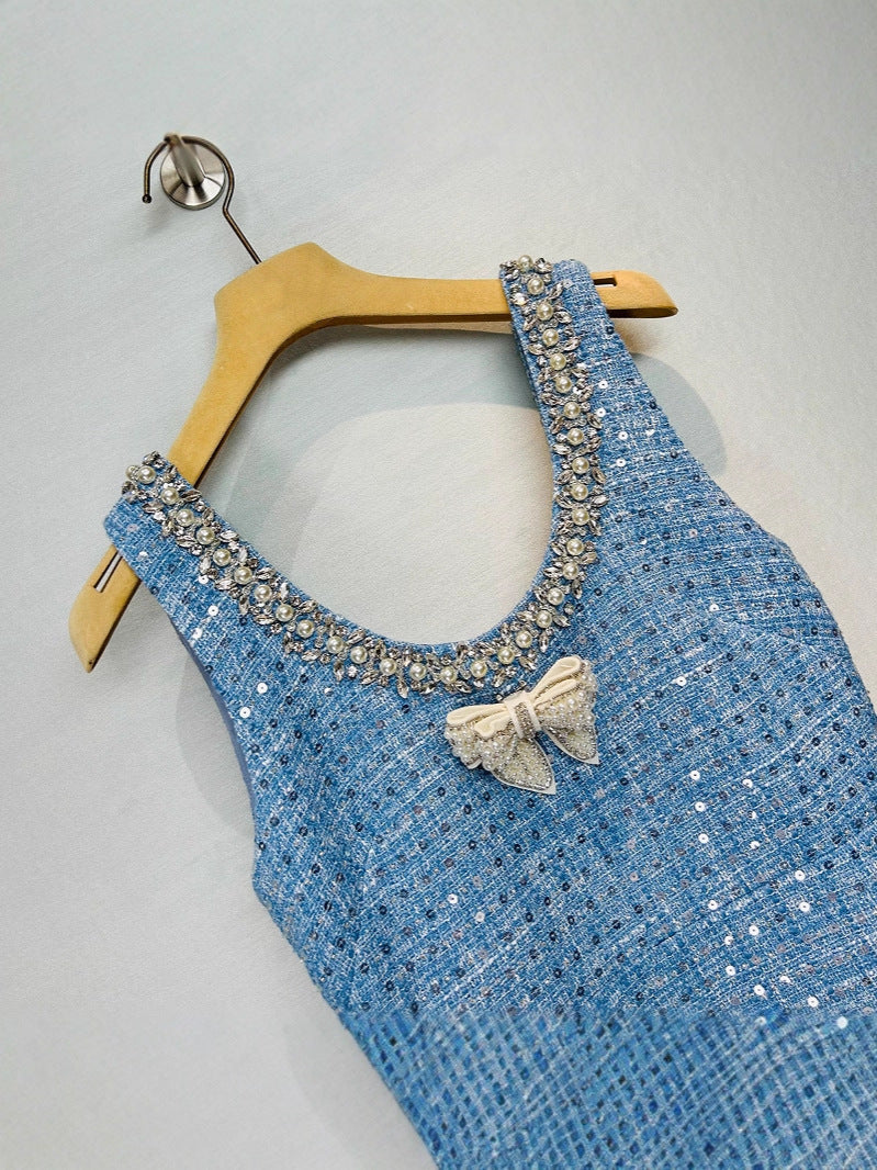 Sequined Bow Sleeess Vest Dress in light blue with decorative beads and bow detail