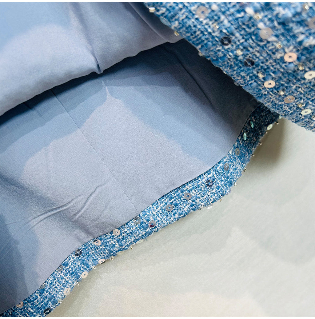 Interior view of AM Vision RO Sequined Bow Sleeveless Vest Dress with a smooth blue lining