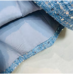 Interior view of AM Vision RO Sequined Bow Sleeveless Vest Dress with a smooth blue lining