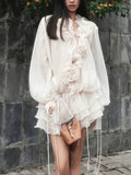 Elegant short lace dress with puff sleeves featuring ruffle details and floral accents by AM Vision RO