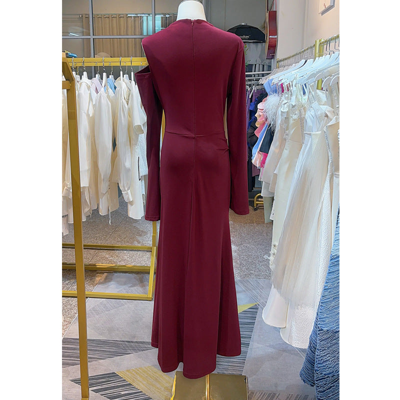 Back view of the Silhouette Muse Pleated Knit Dress in burgundy with long sleeves and fitted silhouette