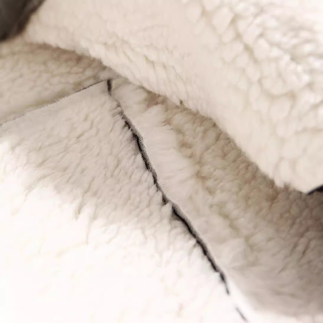 Interior close-up of AM Vision RO Slim Fit Motorcycle Jacket - Synthetic Fiber showcasing its soft lining and stitching