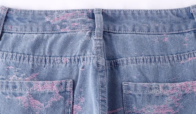 Back view of AM Vision RO Soft Pink Stitch Jeans with distressed details and two back pockets