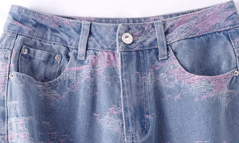 Close-up of Soft Pink Stitch Jeans showing waistband and front pockets with unique stitching detail