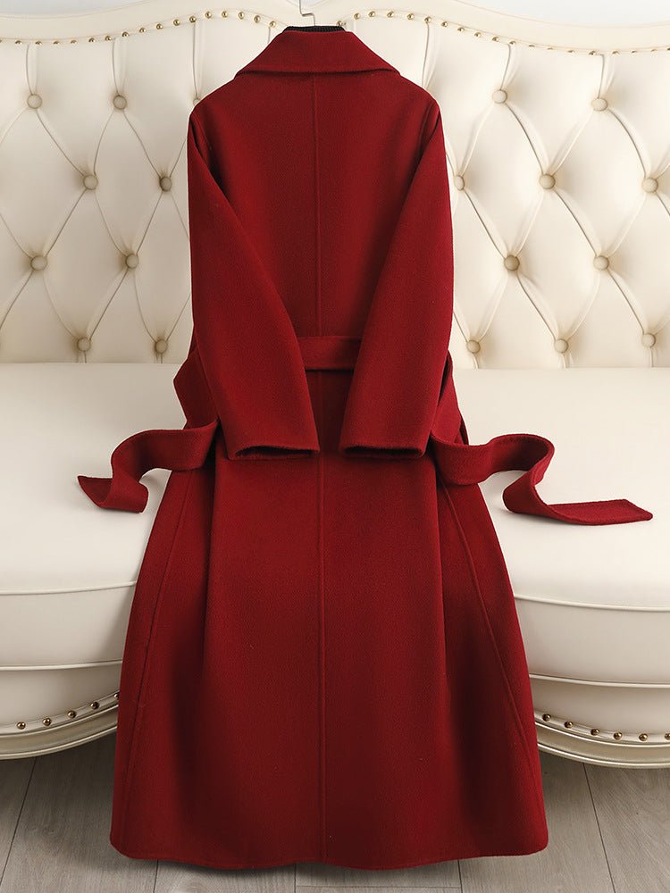Elegant red Sophisticated Wool Coat with a belted waist and a tailored silhouette