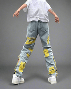 Back view of AM Vision RO Straight Fit Jeans with Artistic Design featuring distressed details and yellow accents
