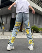 Straight Fit Jeans with Artistic Design featuring Distressed Details and Unique Yellow Accents