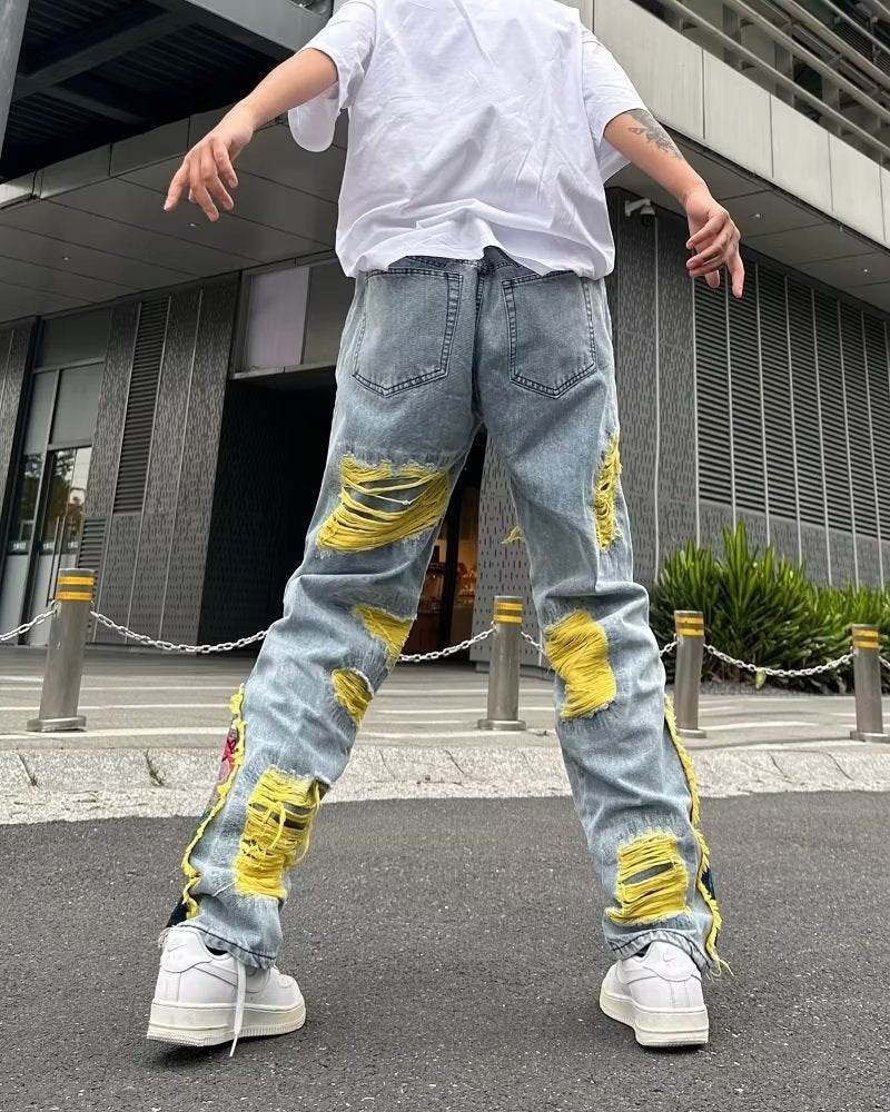 Straight Fit Jeans with Artistic Design featuring Distressed Details and Unique Yellow Accents