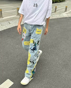 Trendy Straight Fit Jeans with Artistic Design showcasing colorful patches and stylish detailing.