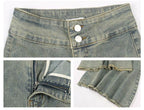 Close-up of My Store stretch flared jeans featuring a button closure and raw hem details