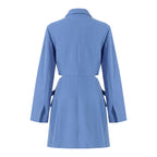 Back view of a stylish blue suit-style dress with a tailored design and side ties