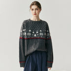 Cozy Christmas knitwear featuring a festive snowflake design in grey and red tones