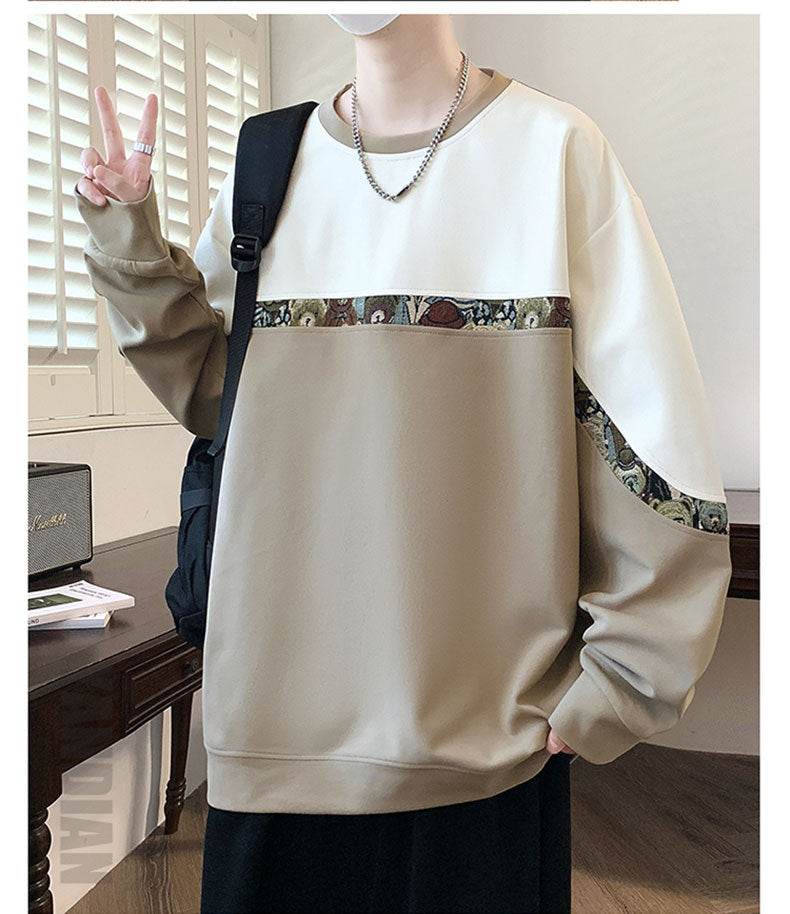 Fashionable Sweater in Various Colors with Embroidered Bear Detail, perfect for casual outfits.