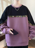 Casual sweater in various colors with embroidered bear detail, showcasing a stylish design and comfortable fit