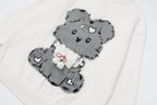 Sweet Bear Knit Sweater in white with cute bear design and fluffy pom poms