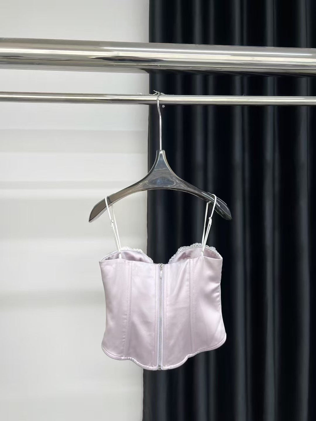 Sweet Desire Pink Bow Camisole on a hanger showing delicate design and soft pink color