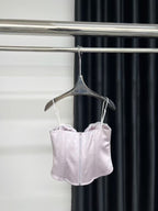 Sweet Desire Pink Bow Camisole on a hanger showing delicate design and soft pink color