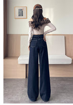 Woman wearing Teddy Stitch Wide Leg Jeans in dark denim with a stylish off-the-shoulder top