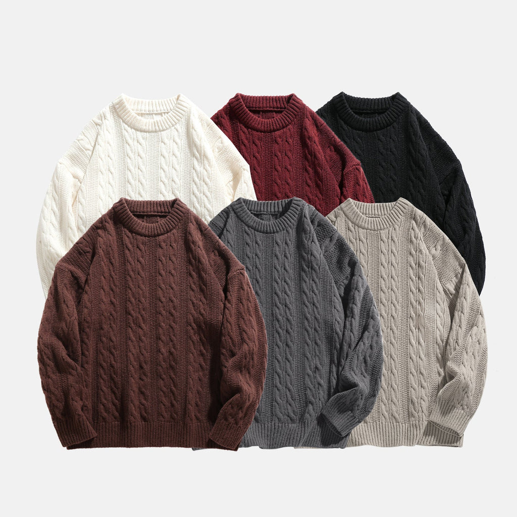 Collection of textured cable knit sweaters in cream, burgundy, black, charcoal, brown, and gray