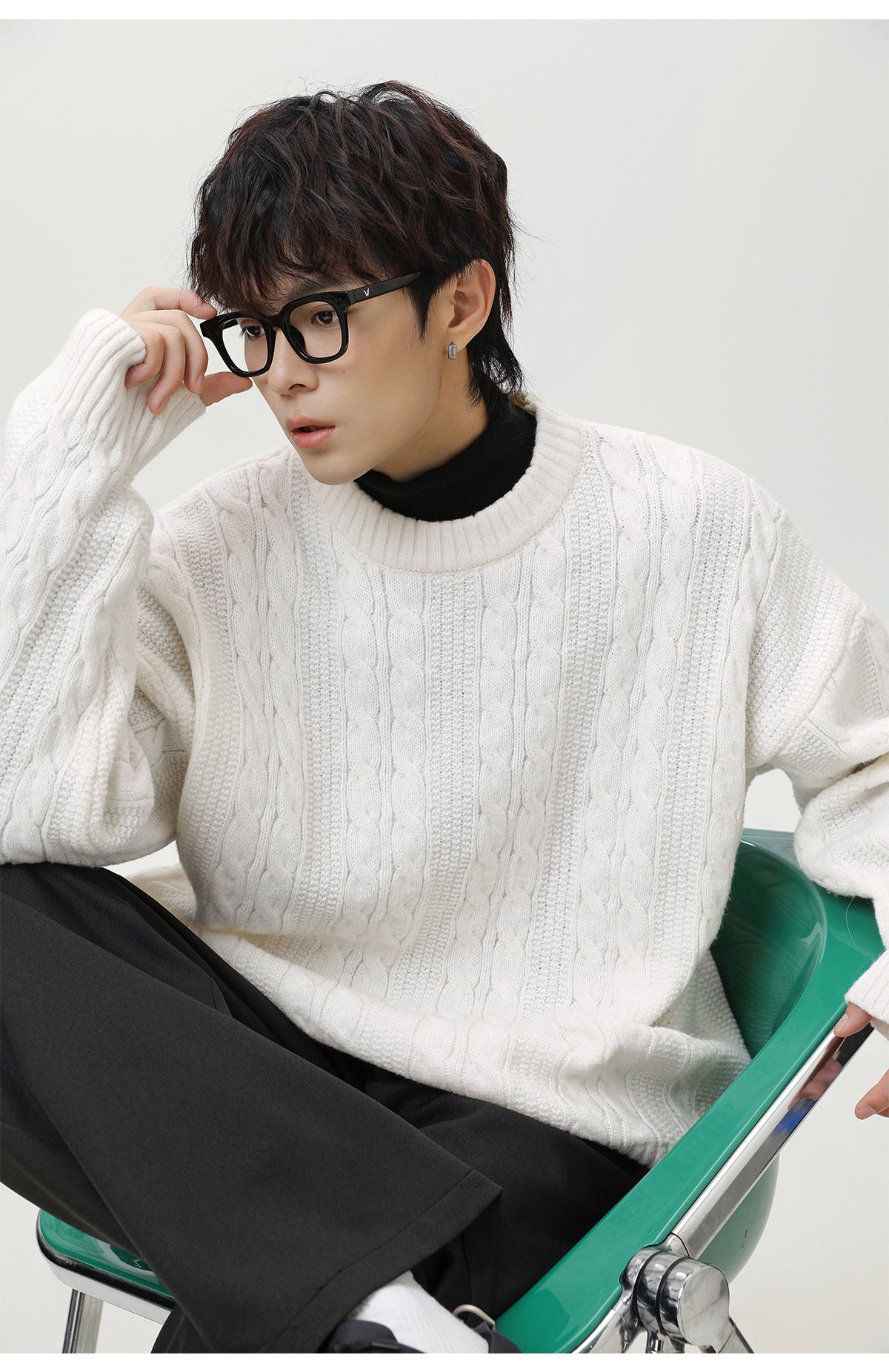 Cozy white textured cable knit sweater for a casual, stylish look in chilly weather