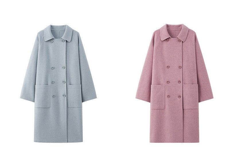 The Amaya Pastel Coat in light blue and pink with a classic double-breasted design and large pockets