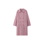 The Amaya Pastel Coat in soft pink featuring a double-breasted design and front pockets