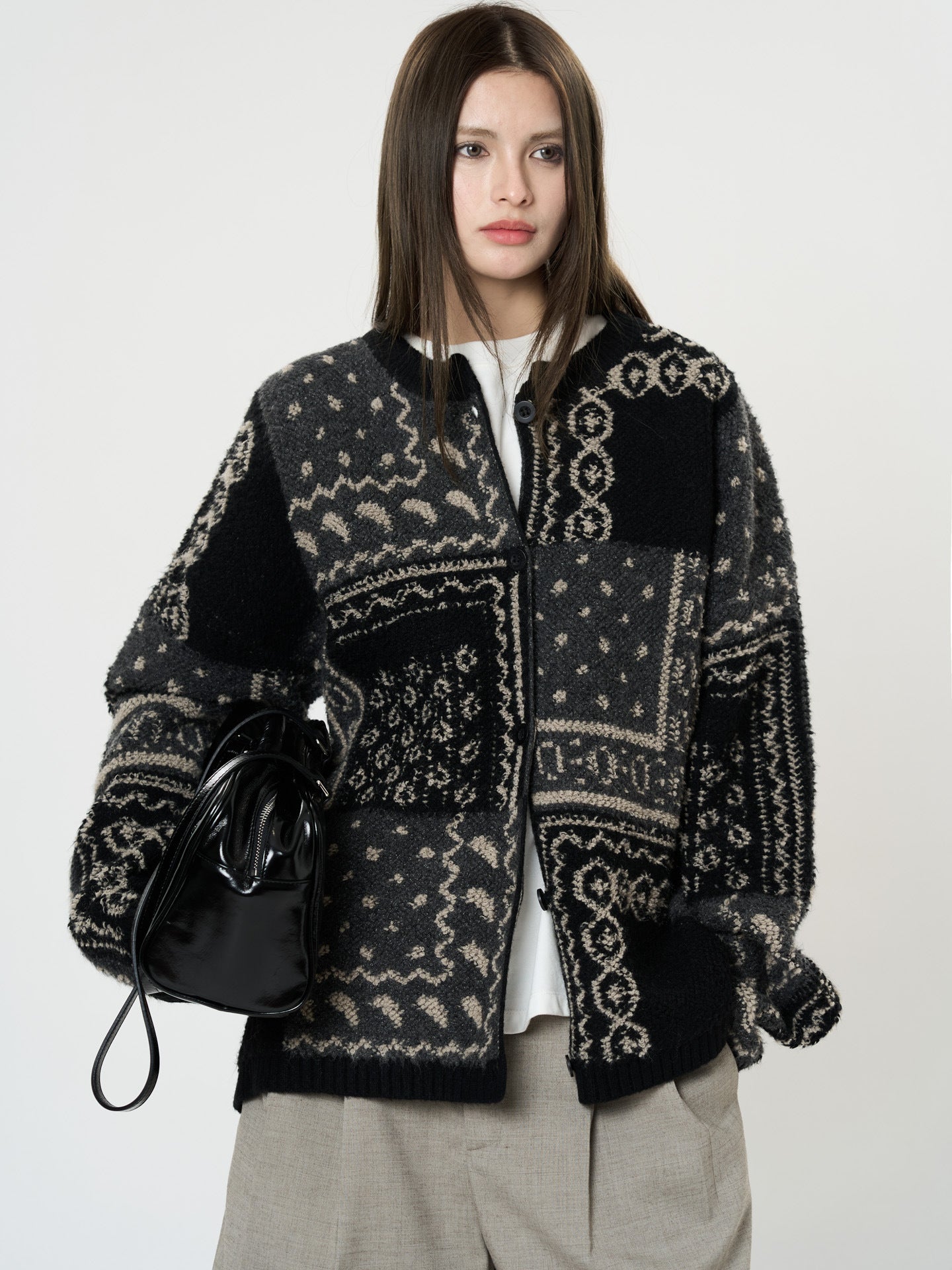 The Kyoto Jacquard Cardigan in black and gray with a stylish oversized fit for a modern look