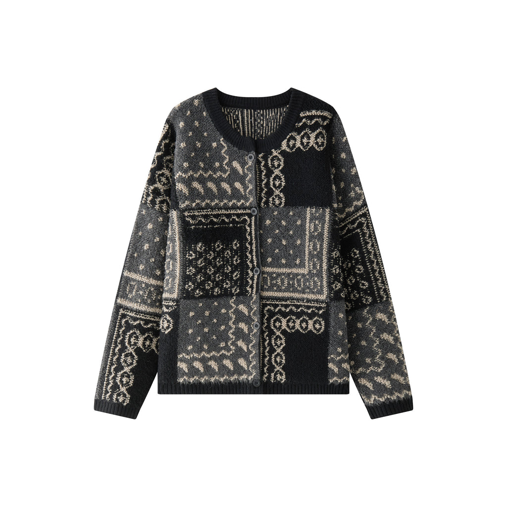 The Kyoto Jacquard Cardigan featuring intricate patterns in black and cream for stylish layering