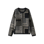 The Kyoto Jacquard Cardigan featuring intricate patterns in black and cream for stylish layering
