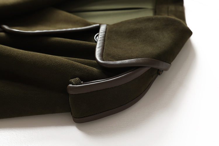 Close-up of The Margaux Trench Coat featuring smooth fabric and stylish collar details