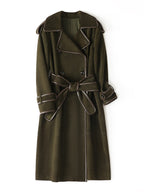 The Margaux Trench Coat in olive green with a belted waist and stylish details