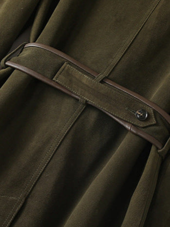 Close-up of The Margaux Trench Coat featuring a stylish belt detail and soft fabric