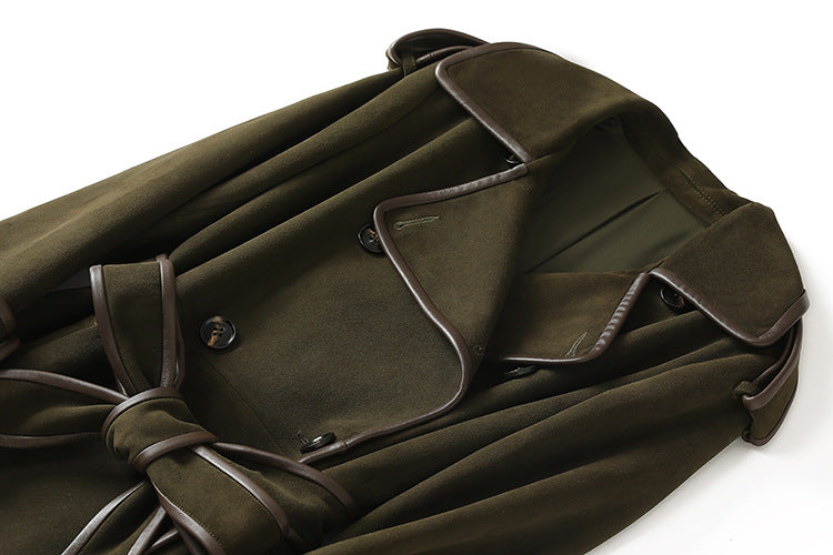 The Margaux Trench Coat in olive green, featuring a belted waist and stylish lapels for a chic look