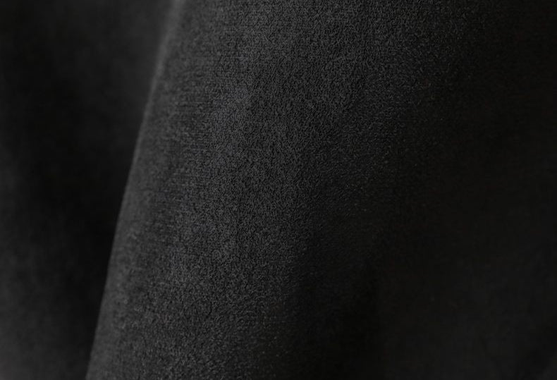 Close-up of soft black fabric detailing of The Panther Wool Coat by AM Vision RO