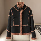 The Panther Wool Coat featuring a stylish design with a soft, plush trim for warmth and comfort