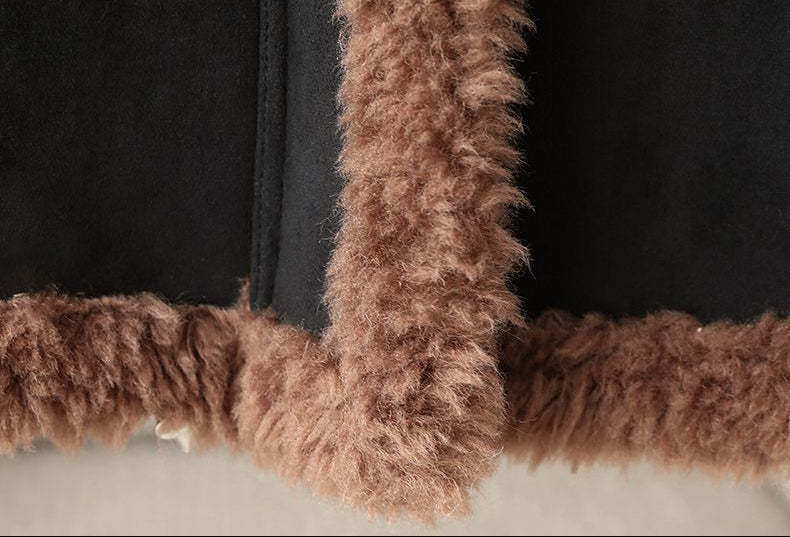 The Panther Wool Coat featuring soft, plush trim for a cozy and stylish look