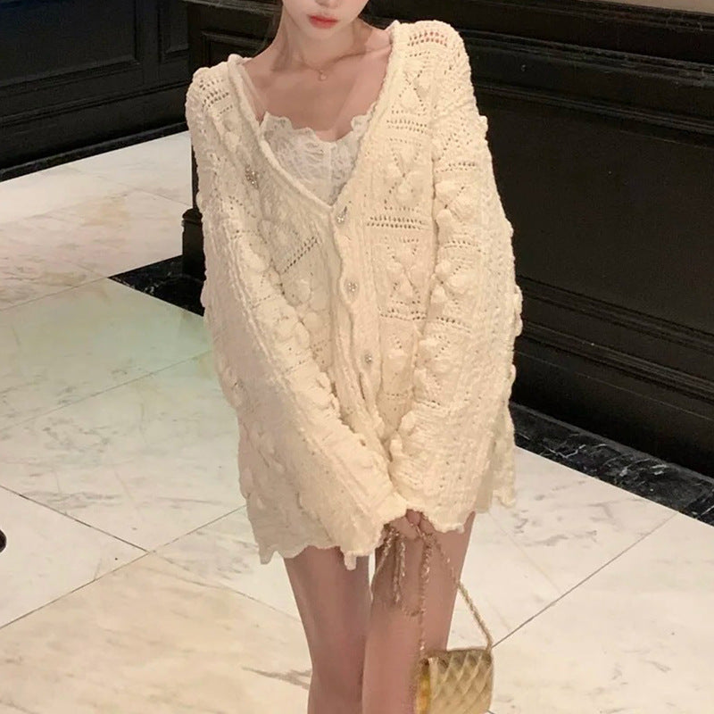 The Petale Knit, Hand Crocheted Wool Cardigan in Cream with Chunky Texture and Button Closure